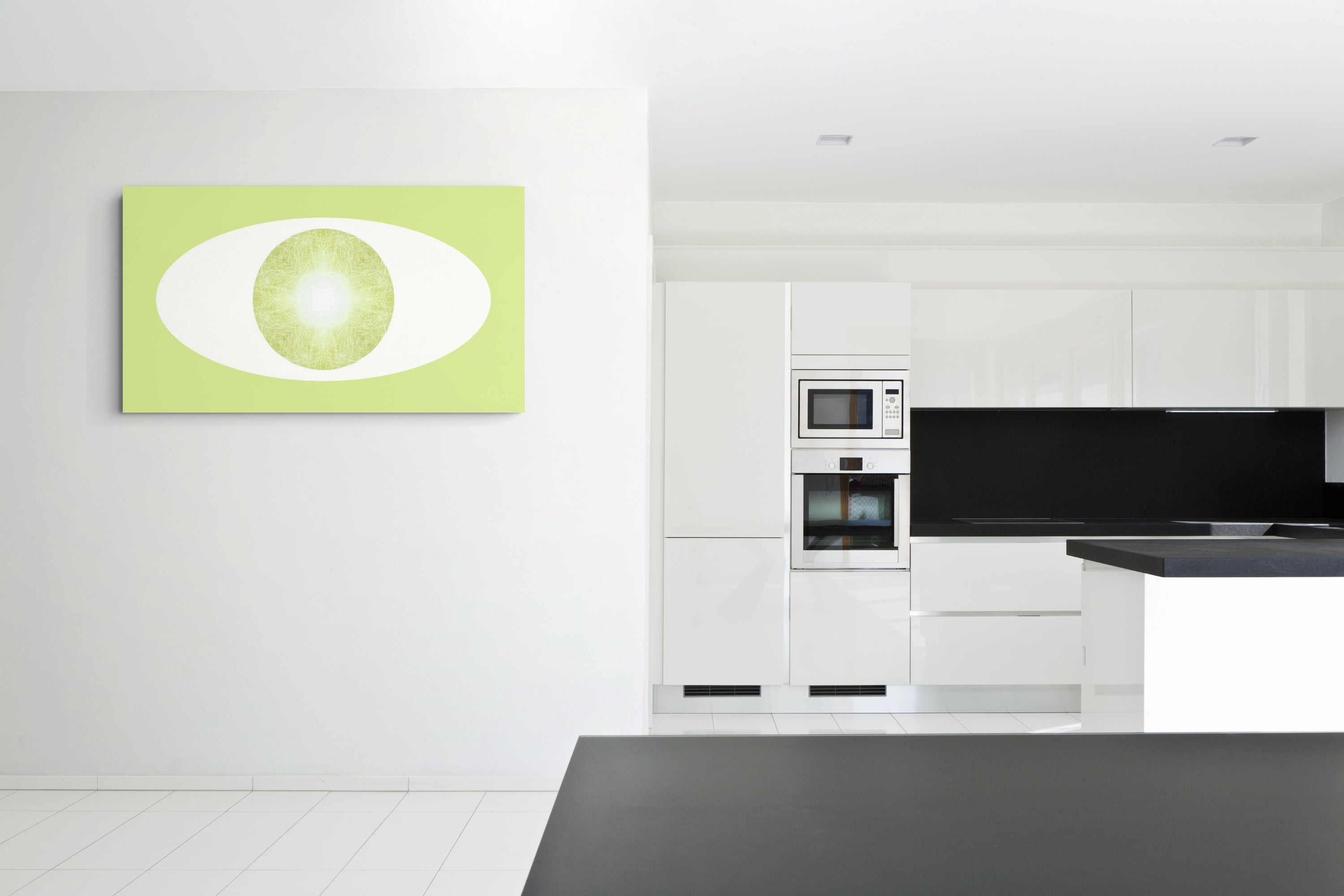 Modern kitchen with white cabinets, black  countertop and backsplash, and a green and white abstract artwork on the wall.
